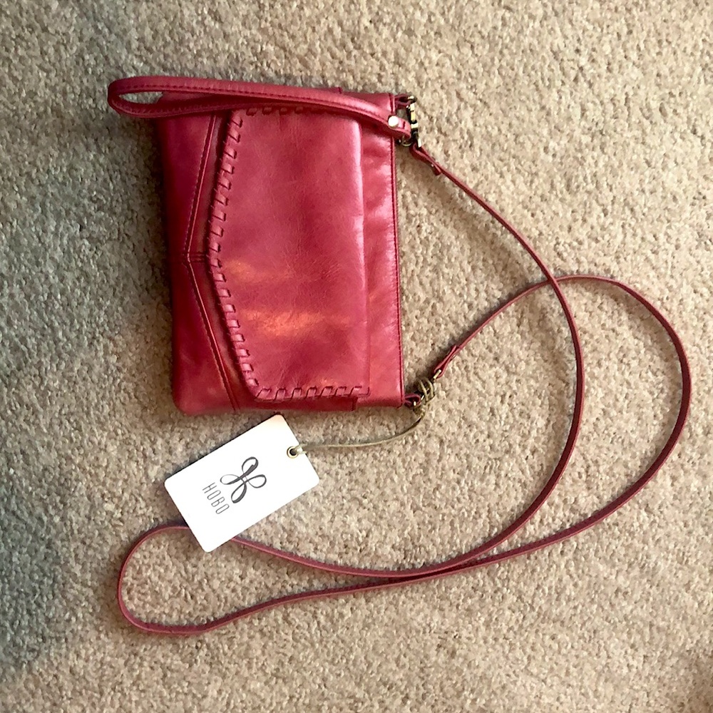 Hobo “stroll” crossbody bag.  Color is Blossom